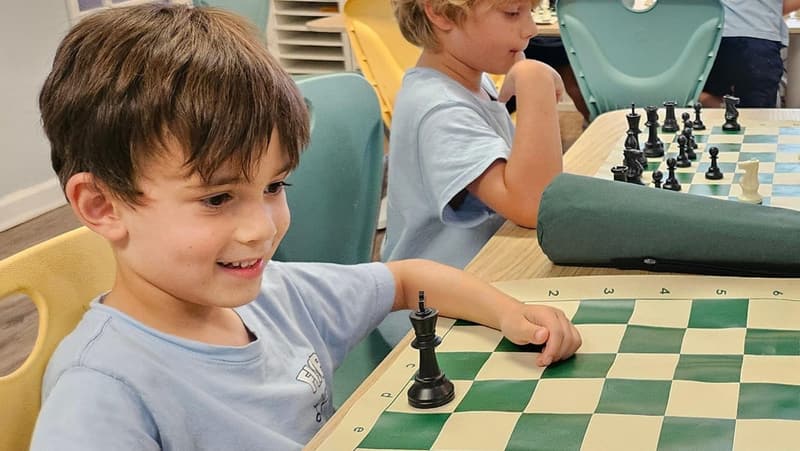 A student playing chess