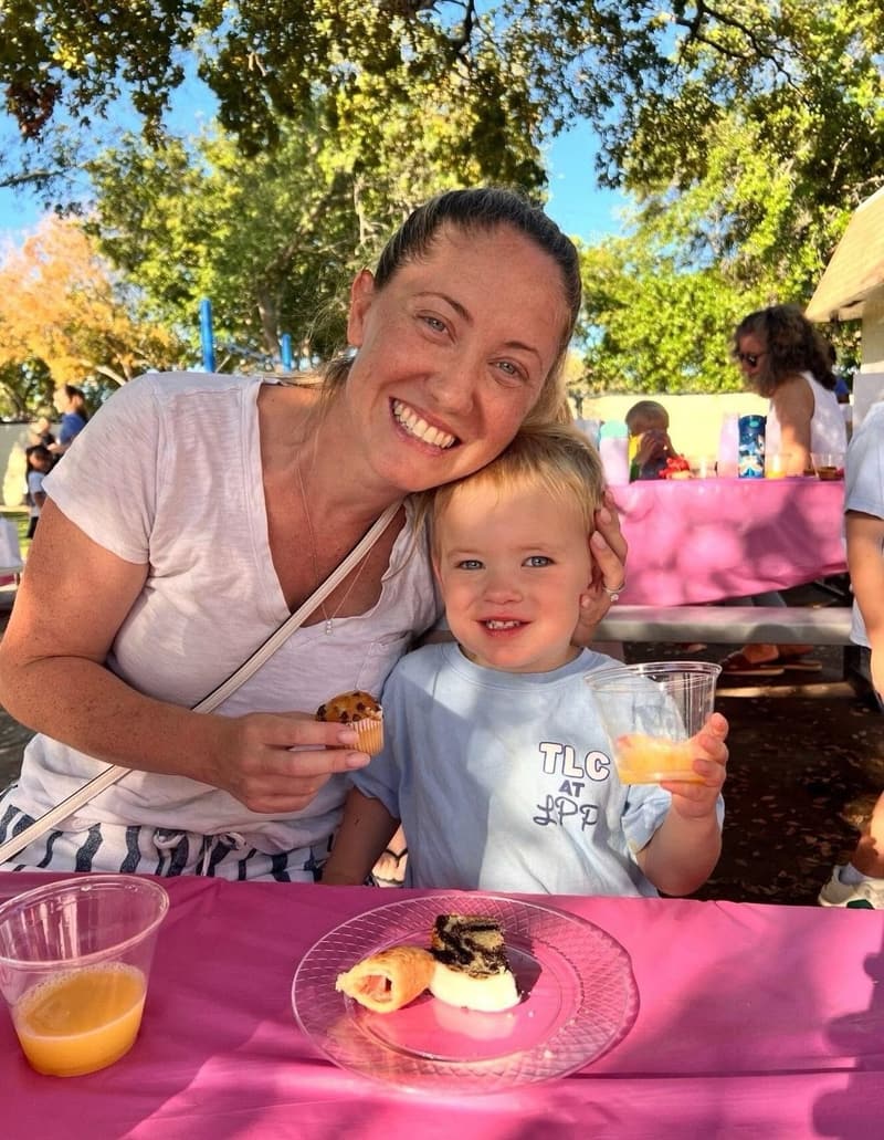 A mom and her daughter at a family breakfast at school