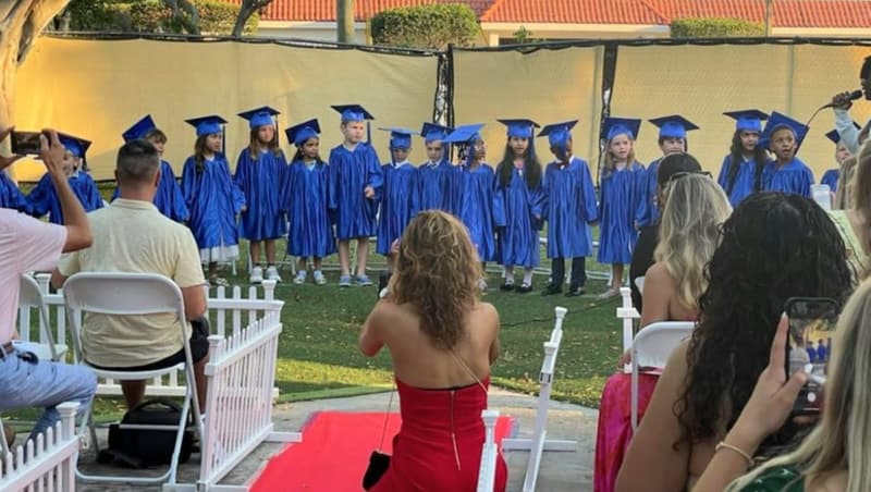 VPK graduates in caps and gowns at the graduation ceremony